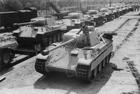 Panther tanks are loaded for transport to frontline units, 1943 / Wikipedia
